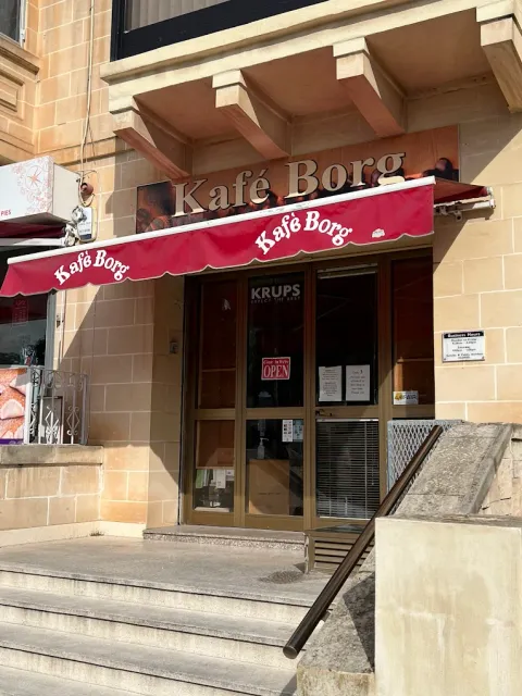 The Kafé Borg shopfront on Tal-Balal Road, San Gwann, with its red awning